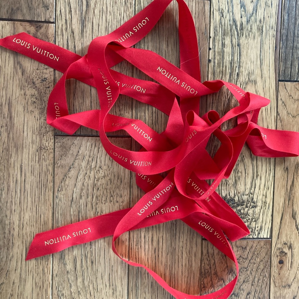 Louis Vuitton authentic red holiday gift wrap ribbon 9.75” ft long